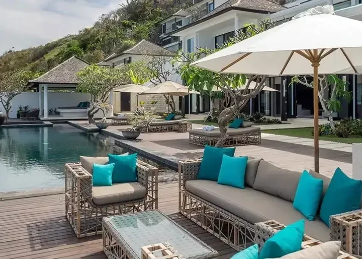 Clifftop villa terrace with shaded seating above the ocean at Nusa Dua