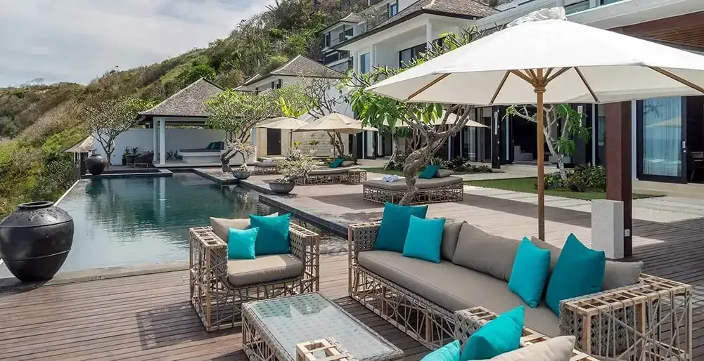 Clifftop villa terrace with shaded seating above the ocean at Nusa Dua