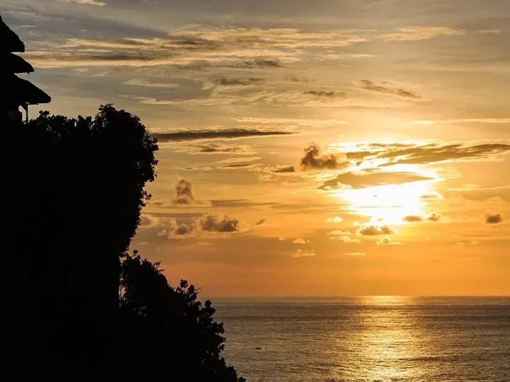 Limestone cliffs and clifftop temple at Uluwatu on the Bukit Peninsula, South Bali