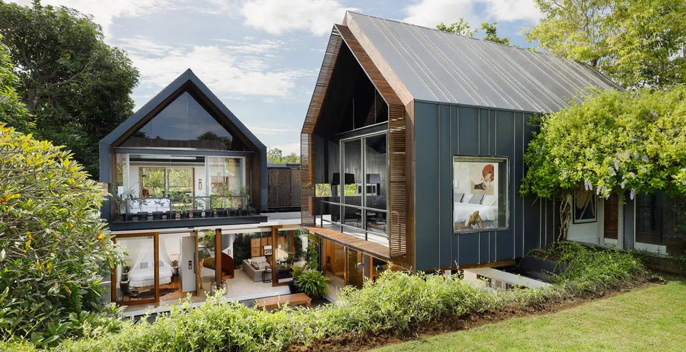 Contemporary Balinese villa with a pitched roof and garden frontage